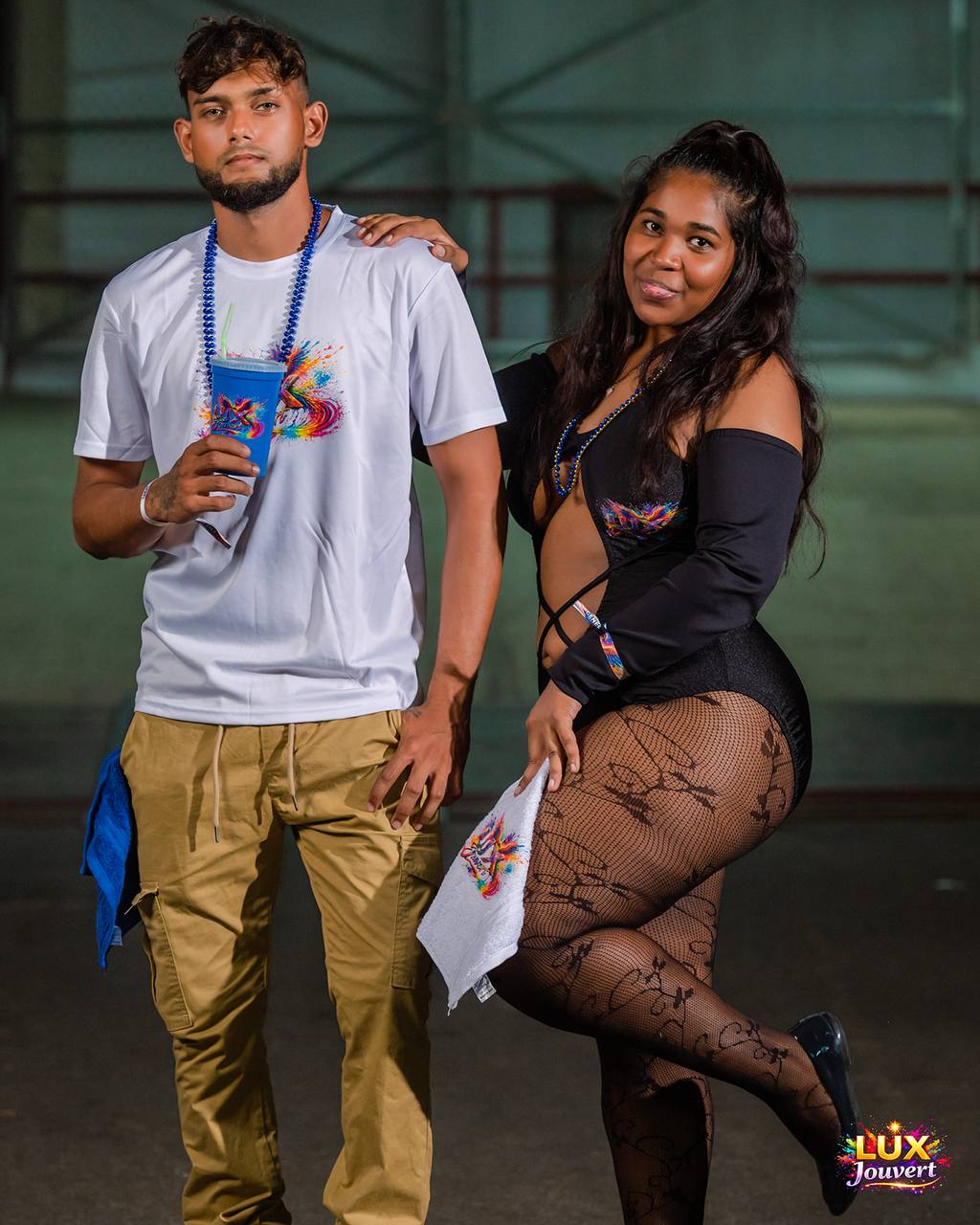 Couple in LUX J'Ouvert gear at the event